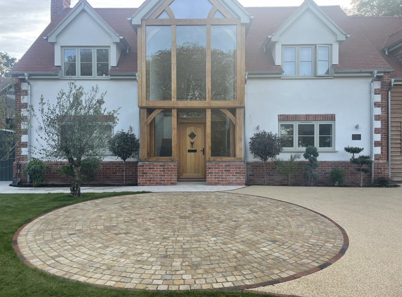 Glazed oak-framed entrance on Oakleigh Lodge, a new build home by Raptor Construction near Ross-on-Wye